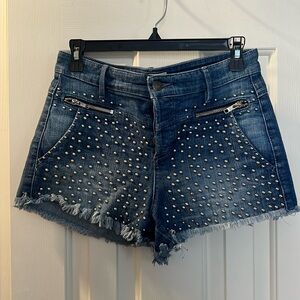 Guess blue denim shorts with studs size 27 small.